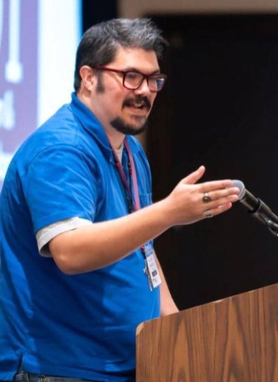 Bradley speaks at a podium